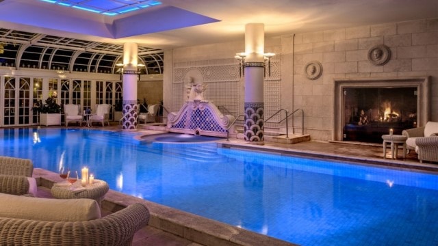 Indoor pool nightime in the Hilton Cavalieri hotel